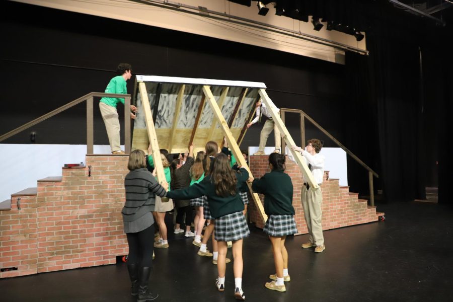 One of the Stagecraft classes assembles the set for the fall musical.